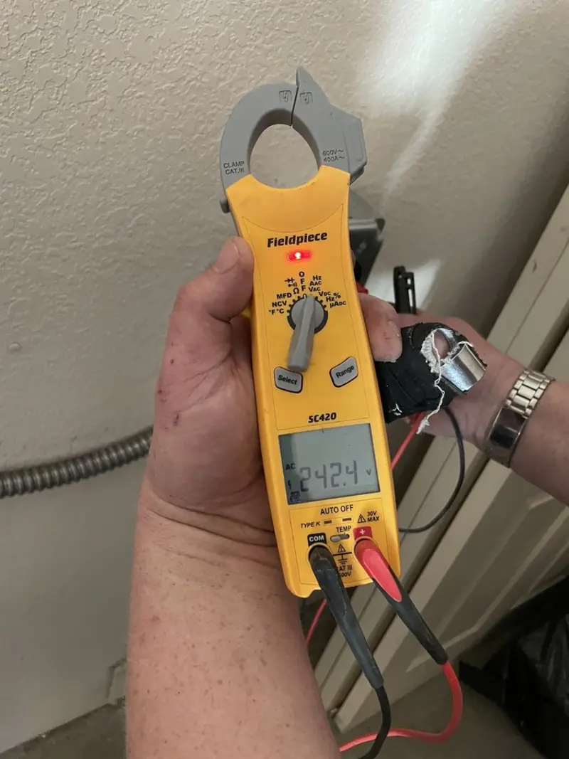 Voltage testing with clamp meter during Circuit Breaker Repair in Harborcreek
